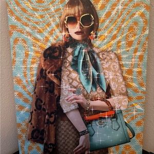 A Chanel/gucci wall decor